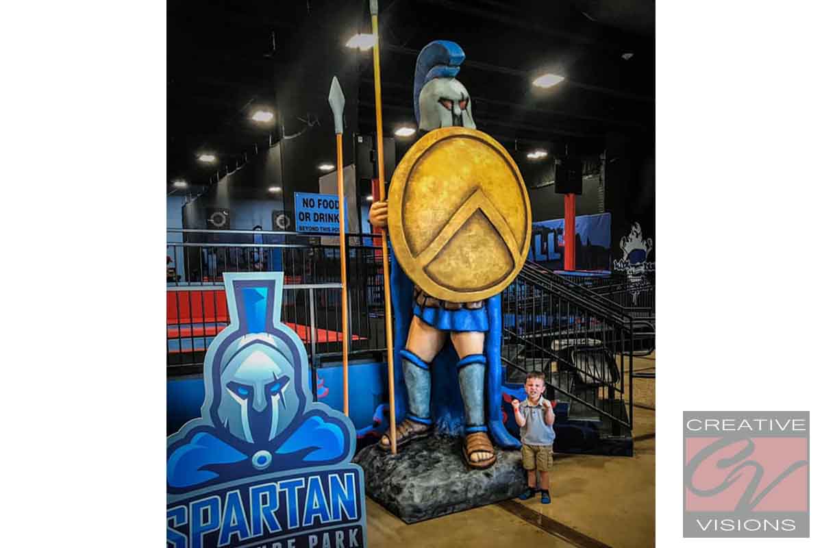 Custom Spartan warrior statue at a family entertainment center