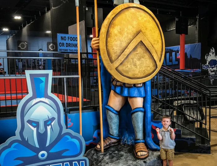 Custom Spartan warrior statue at a family entertainment center